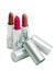 Three lipsticks isolated over white background