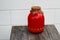 A three-liter glass jar of homemade tomato juice
