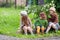 Three little adorable sisters girls having rest at the ranch together