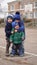 Three little boys together at a playground near art school