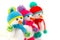 Three Little cute crocheted snowmans in a multicolor hats and scarfs on a white background