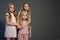 Three little girls blonde girlfriends sisters portrait