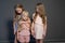 Three little girls blonde girlfriends sisters portrait