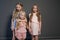 Three little girls blonde girlfriends sisters portrait