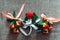 Three little wedding boutonniere with roses with a ribbon