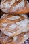 Three loaves of rustic sourdough bread, close up