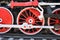 Three locomotive wheels