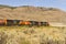 Three locomotives pulling train