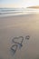 Three love hearts on a beach