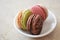 Three macarons on the dish