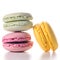 Three macaroons on white