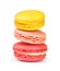 Three macaroons on a white background