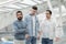 Three Male Friends Having Quarrel Traveling Together Standing In Airport