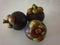 three mangosteens in the white table