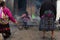 Three Mayan women from Guatemala perform a religious rite at the entrance of the Santo TomÃ¡s de Chichicastenango cathedral.