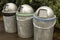 Three Metal Recycle Bins, color coded