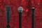 Three microphones in defocused background and red