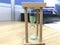 A three minutes Green color sand glass timer is active for an meeting time as a deadline for an task to an employee to complete