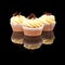 Three muffin cupcake with yellow cream and pieces of chocolate