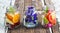 Three mug delicious refreshing drink of mix fruits and herb on wood