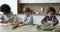 Three multi ethnic boys prepare cookies from homemade dough