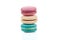 Three multicolored stacked macaroons isolated