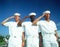 Three Multicultural Sailors Saluting