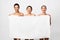 Three Multiethnic Women Holding Bath Towel Posing, Studio Shot