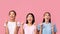 Three Multiracial Girls Pointing Fingers Upward Posing, Panorama, Studio Shot