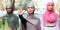 Three Muslim Women Gesturing Stop Protesting Against Something Standing Outdoors