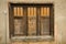 Three old doors, brown with windows, Jackson, Wyoming.