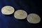 Three old twenty Paise nickel brass round coin of India 1971 with lotus flower engraved on black background. 20 Paise old coins