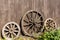 Three old wagon wheels