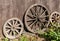 Three old wagon wheels