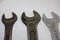 Three old working wrenches on a white background. Work Tool mechanic. Close up