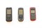 Three older mobile phone press the button old generation arrangement flat lay style