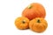 Three orange decorative pumpkins