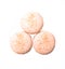 Three orange macaroon cookies isolated