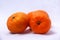 Three orange mandarin fruit grup photo.