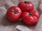Three organic tomatoes