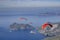 Three paragliders fly over the coastline from the top of Babadag,