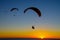 Three paragliders at sunset near San Diego, CA.