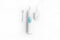 Three part of electric toothbrush in center on white background with top view