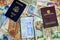 Three Passports and Currency