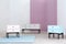 Three pastel cabinets set in a room interior with white and pink