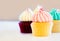Three Pastel color Cup cake muffins