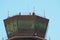 Three people in an airport control tower, lerida