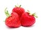 Three perfect red ripe strawberry isolated