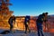 Three photographers prepare for sunrise shoot over bryce canyon national park