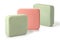 Three pieces of green and pink toilet soap on a white background. Full depth of field.